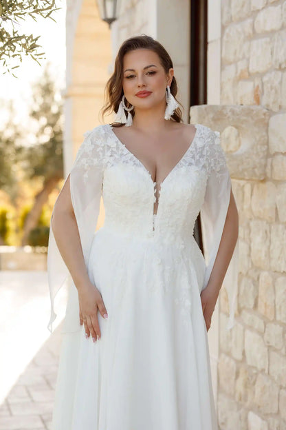 Flowing chiffon sleeve detail on plus size bridal gown