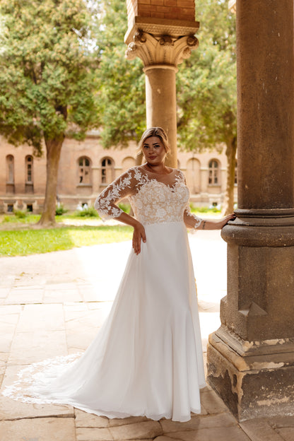 A-line wedding dress for plus size brides with illusion lace bodice and soft chiffon dress