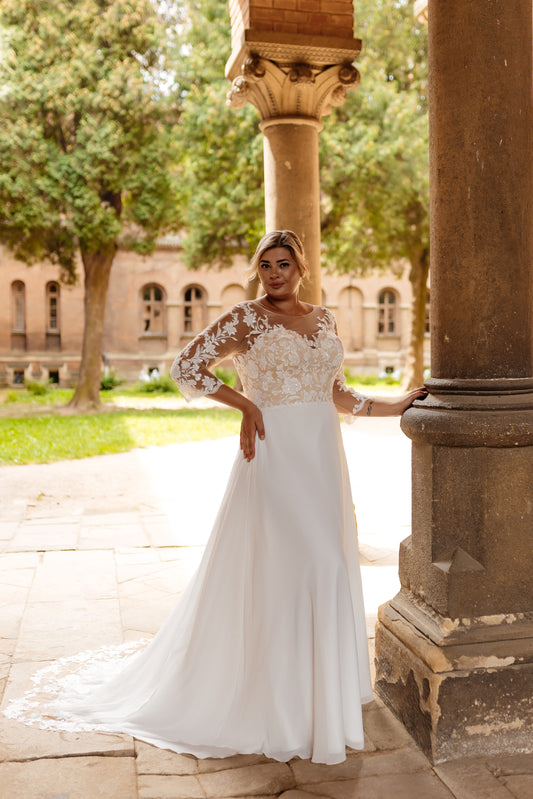 A-line wedding dress for plus size brides with illusion lace bodice and soft chiffon dress
