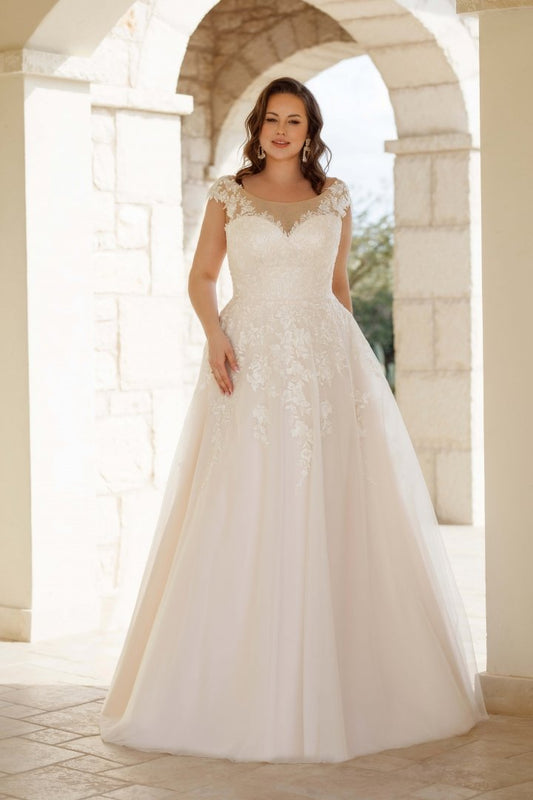 Plus size A-line wedding dress with lace bodice and cap sleeves