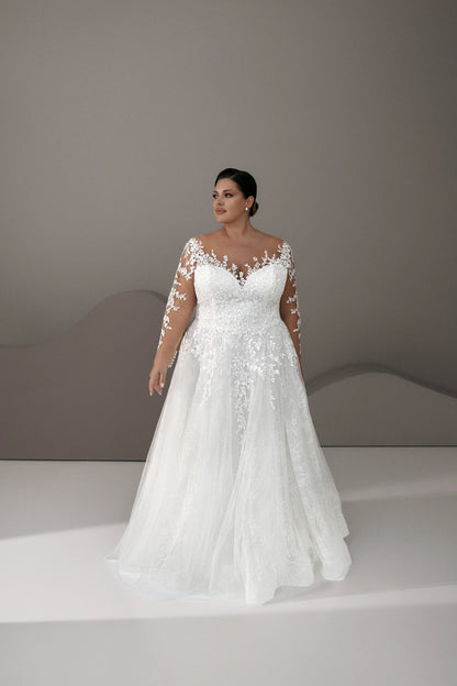 Front view of plus size lace wedding dress with illusion neckline

