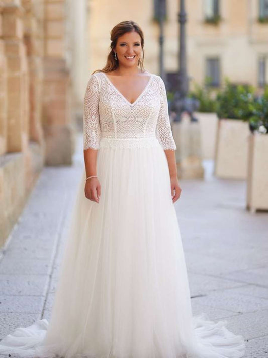 Plus size lace wedding gown with V-neck and 3/4 sleeves front view