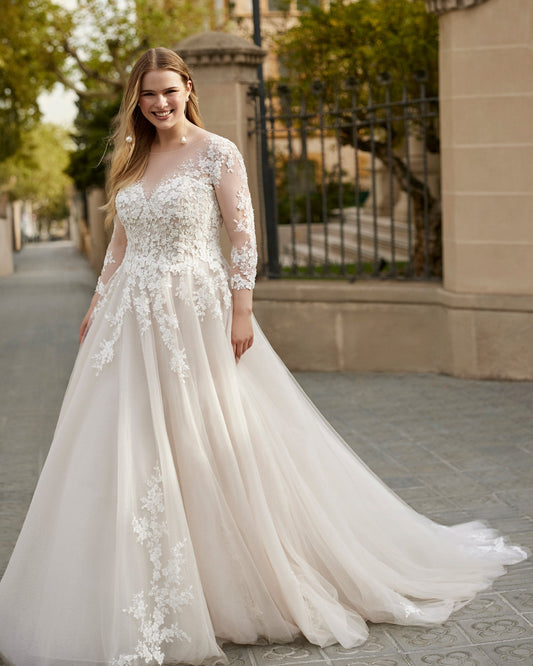 Plus size long sleeve lace wedding dress front view