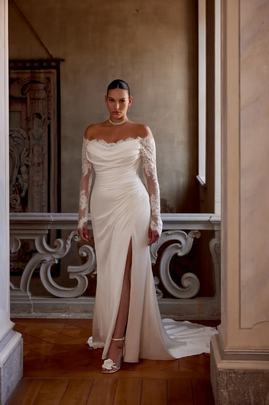 Plus size mermaid wedding dress with off-shoulder lace neckline and satin skirt