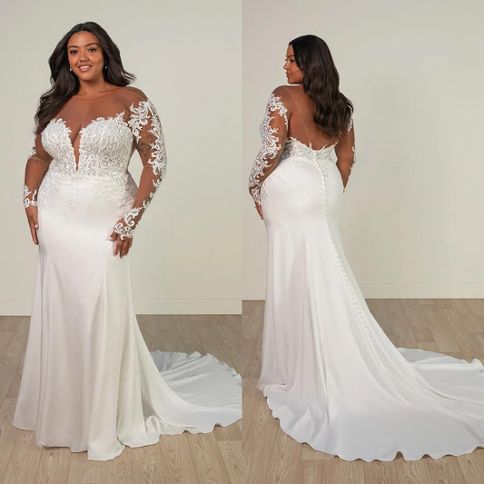 Plus size mermaid wedding dress with lace bodice and long sleeves