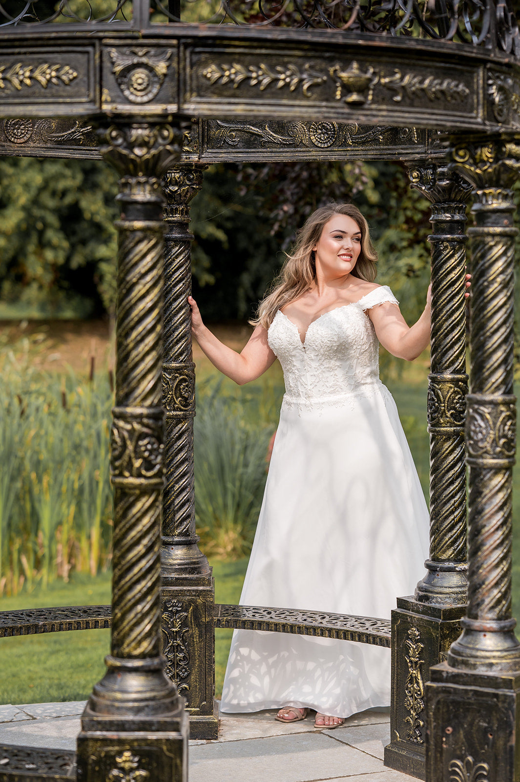 Front view of boho off-shoulder wedding dress with V-neck for plus size bride
