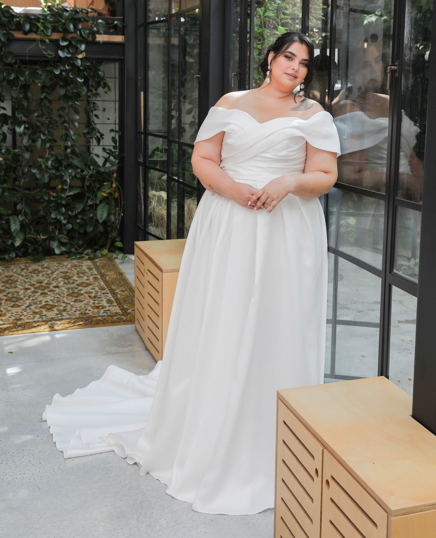 Off-shoulder satin A-line wedding dress with V-neck for plus size bride