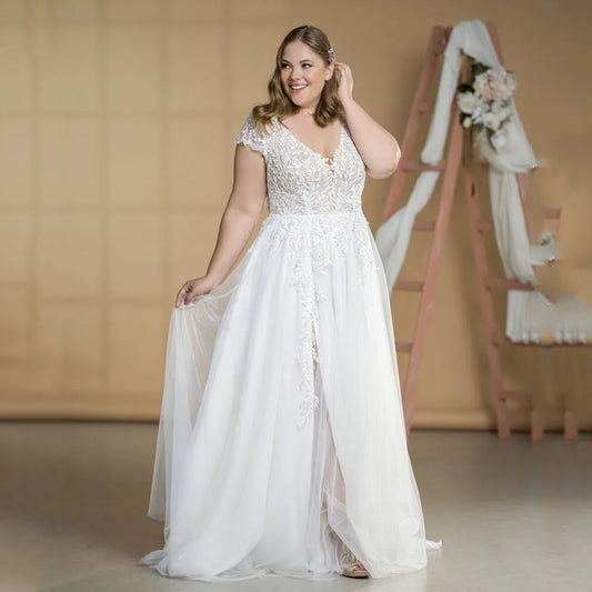Modern plus size wedding dress with V-neck and cap sleeves

