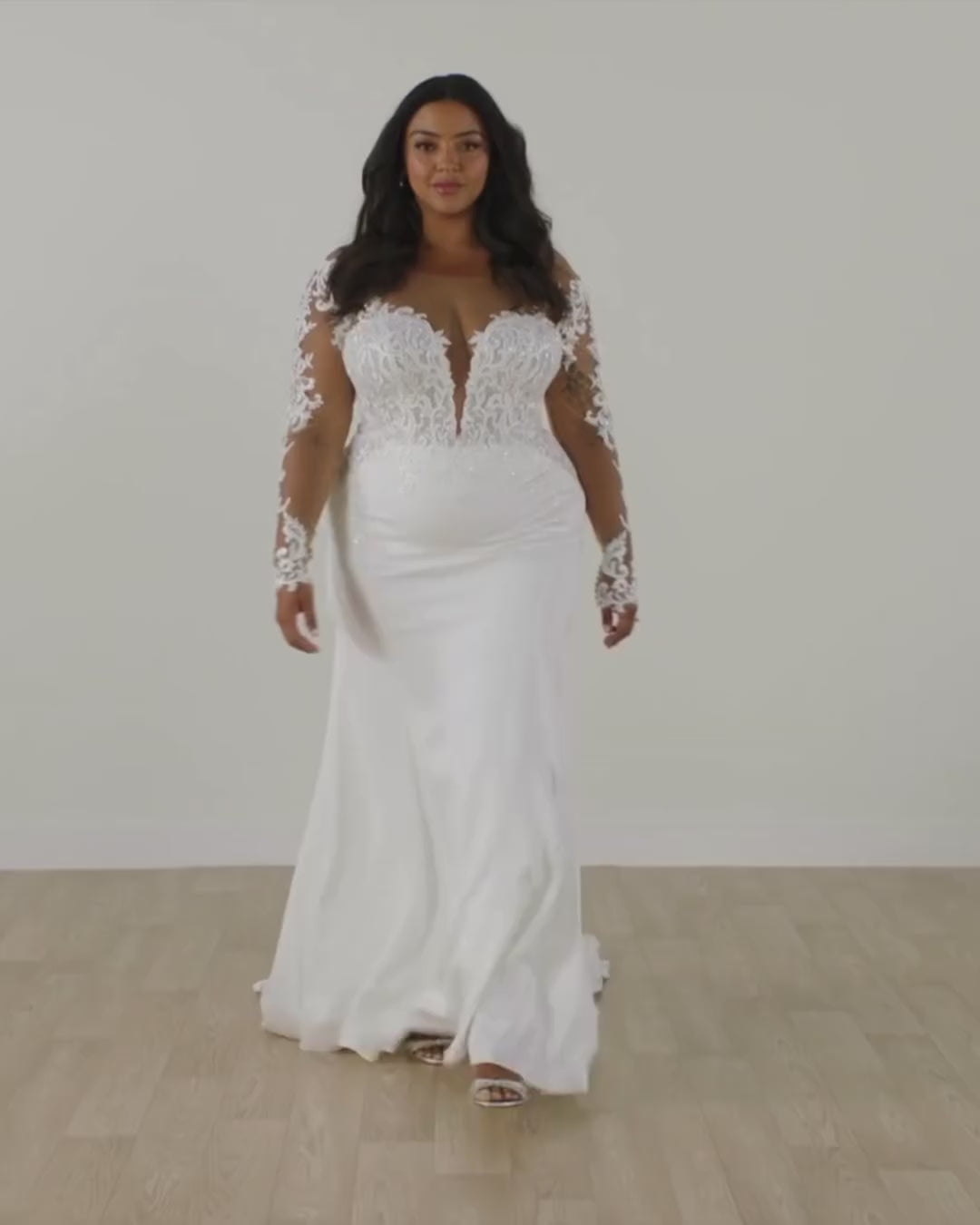 Back view of satin mermaid bridal gown with illusion back and buttons