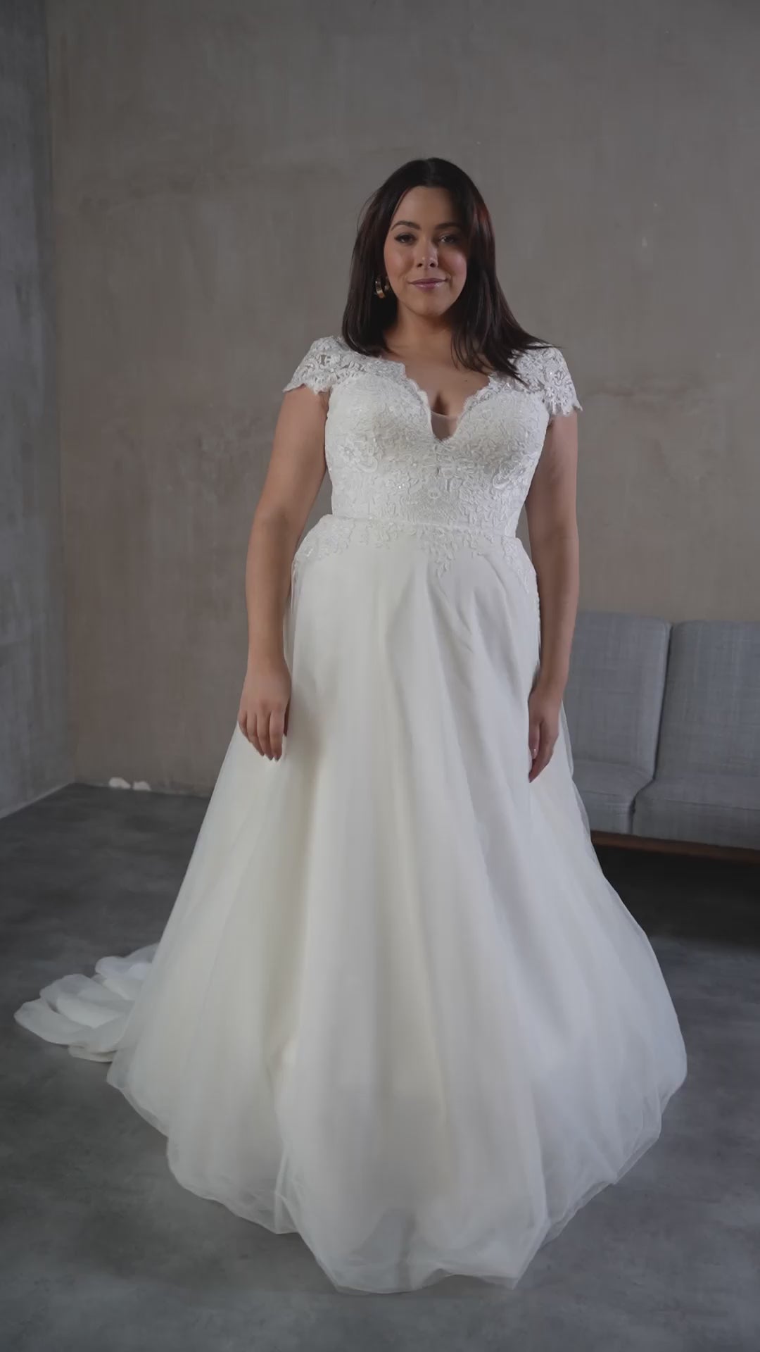 Elegant plus size wedding dress styled for modern brides