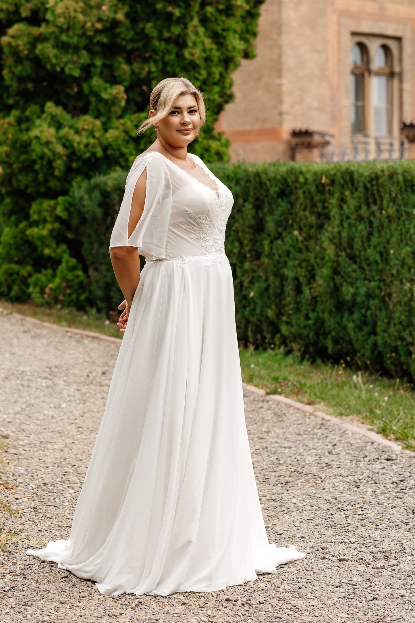 Romantic civil wedding dress for curvy brides with lace detailing and comfortable chiffon fit