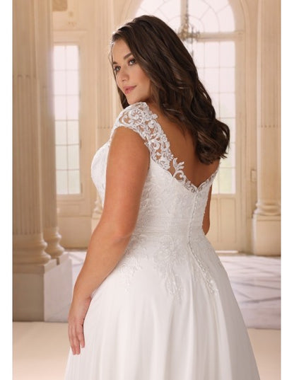 Romantic plus size gown with lace appliqué and V-neckline