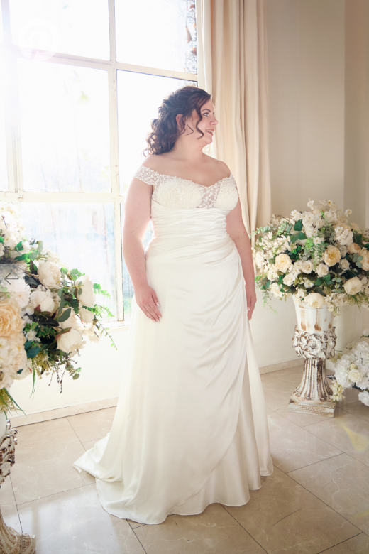 Romantic satin plus size wedding dress with off-shoulder sleeves