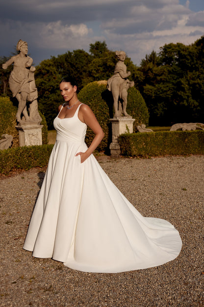 Simple plus size wedding dress with sweep train and classic design