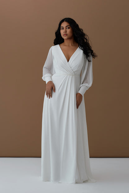 Simple plus size bridal gown with puff sleeves