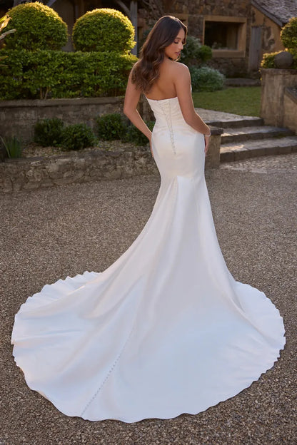 Strapless modern mermaid gown for curvy bride with clean lines