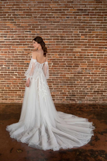 weetheart neckline and sheer off-shoulder sleeves on plus size bride dress